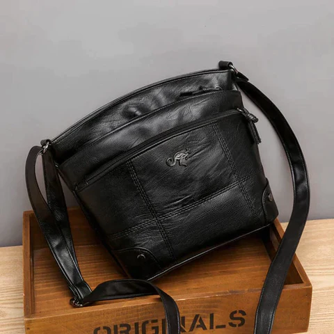 Caliara - veganläder crossbodyväska
