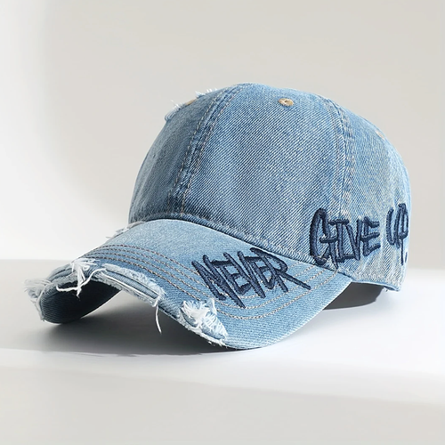 Sliten denimkeps i baseballstil med broderi Never Give Up