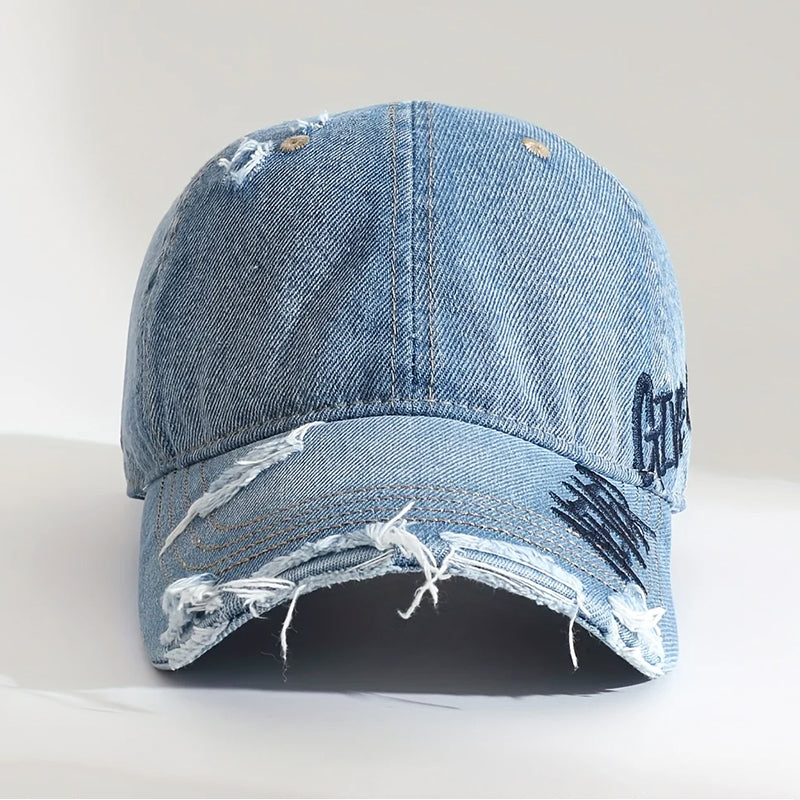 Sliten denimkeps i baseballstil med broderi Never Give Up