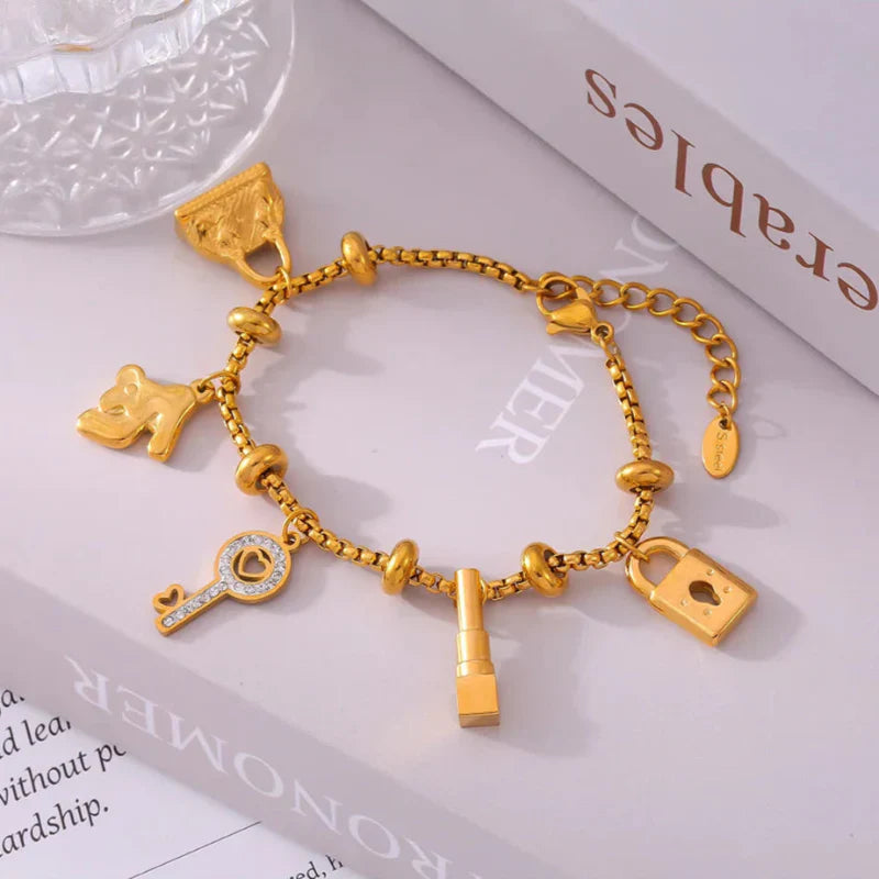 Aurelia guldpläterat berlockarmband