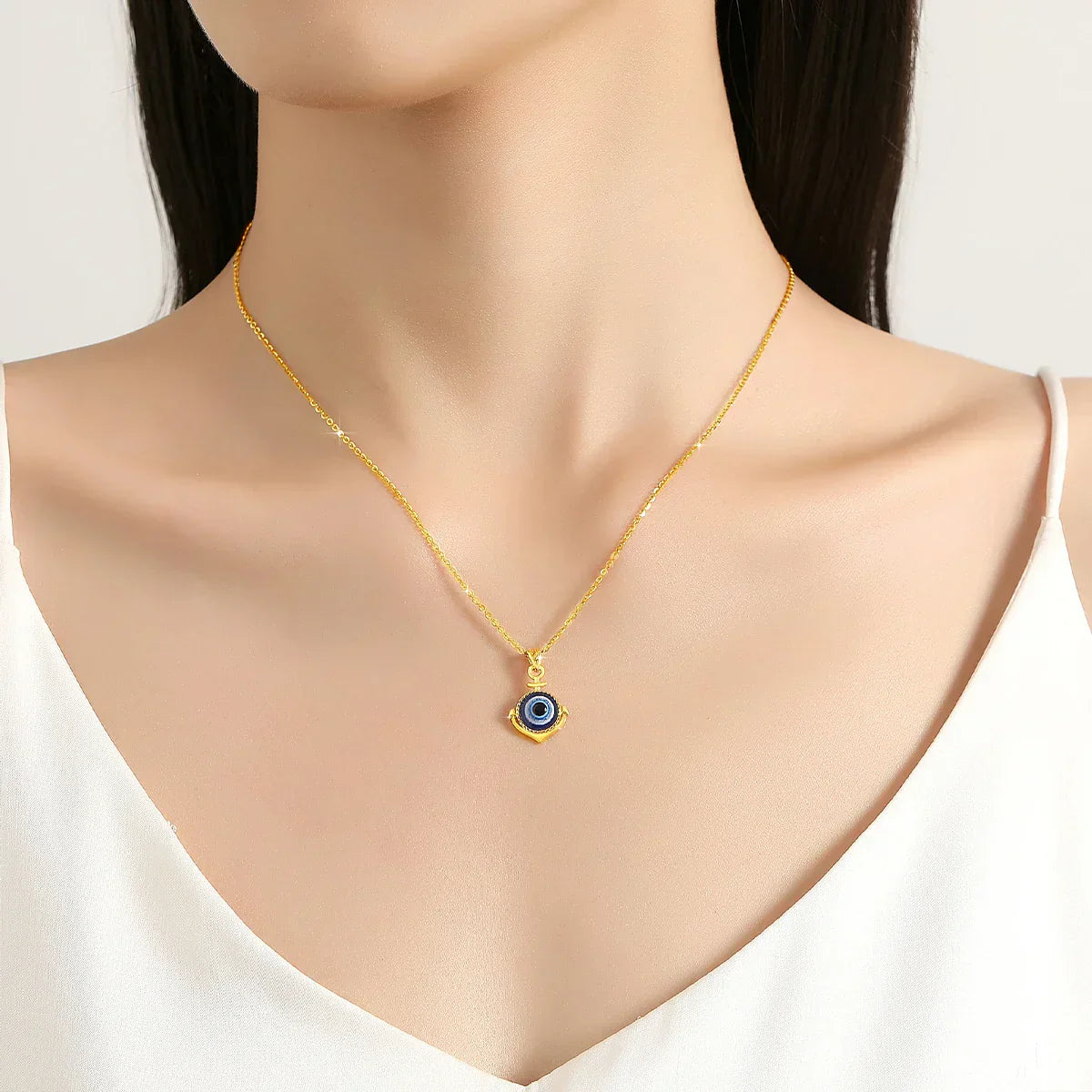 Himmelskt öga guld halsband med onda ögat