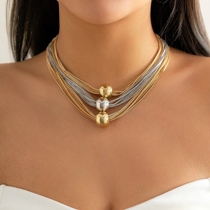 Nocturne draperat halsband med bollar