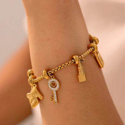 Aurelia guldpläterat berlockarmband